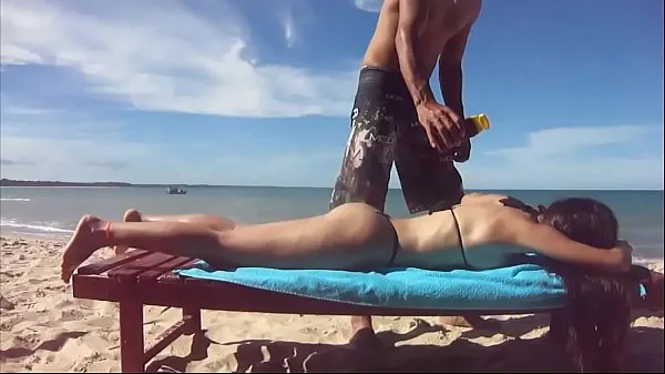 HD wife with microbikini on the beach and getting a tan 에너지 클립