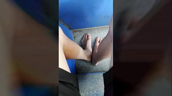 Clip năng lượng Twink walking barefoot on the road and still no shoe in a tram to the city HD